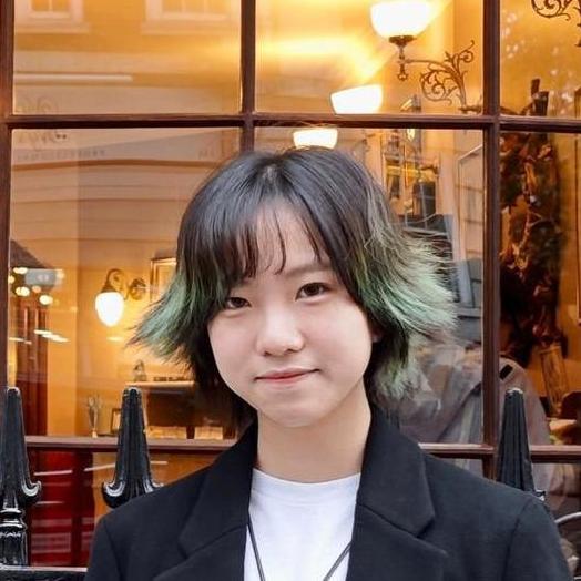 A photograph of the face of Amy Ko.