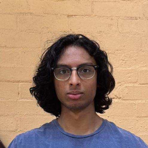 A photograph of the face of Sanjay Ashwin.